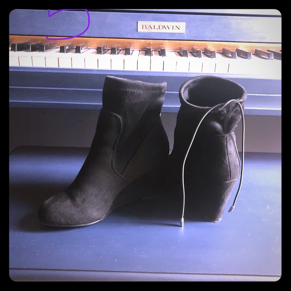 Wedge boots with cute straps on the back
